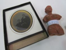 A clay small female torso figurine; a framed & glazed model cork sailing vessel; a framed & glazed