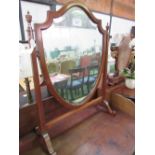 Large Edwardian mahogany shield-shape dressing table mirror with bevelled glass supported by