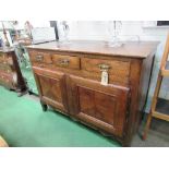 Continental fruit wood sideboard of 3 frieze drawers above preparation slide over double cupboard on