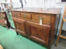 Continental fruit wood sideboard of 3 frieze drawers above preparation slide over double cupboard on