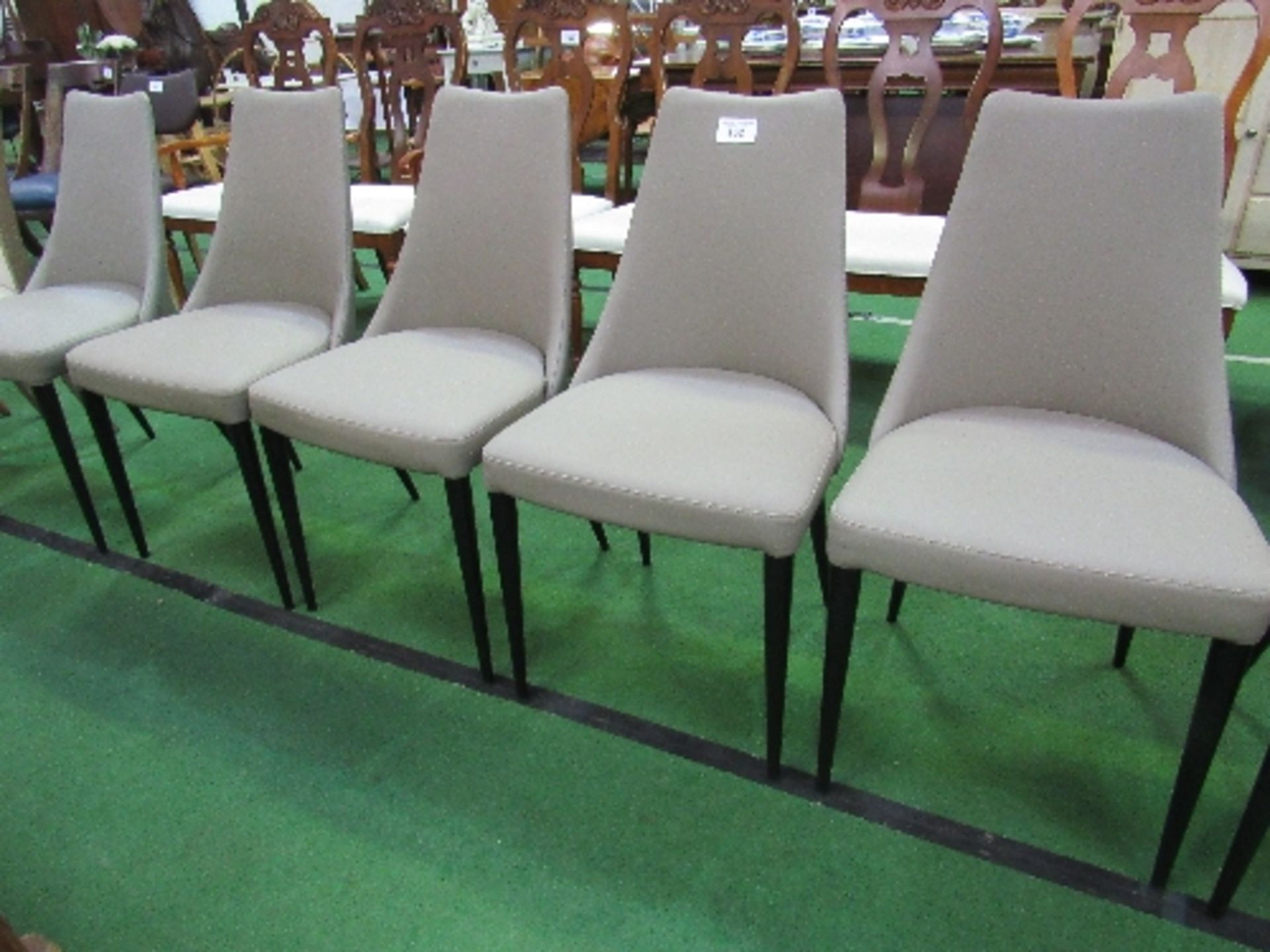 A set of 6 grey leather-effect upholstered dining chairs