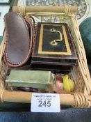 Basket of miscellanea including a cash box with coins