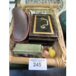 Basket of miscellanea including a cash box with coins