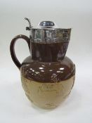 Doulton Stoneware jug with silver plate top & with a military inscription dated, 1881