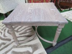 A pair of limed oak effect display tables, 24" x 24" x 18" (high) & a table lamp