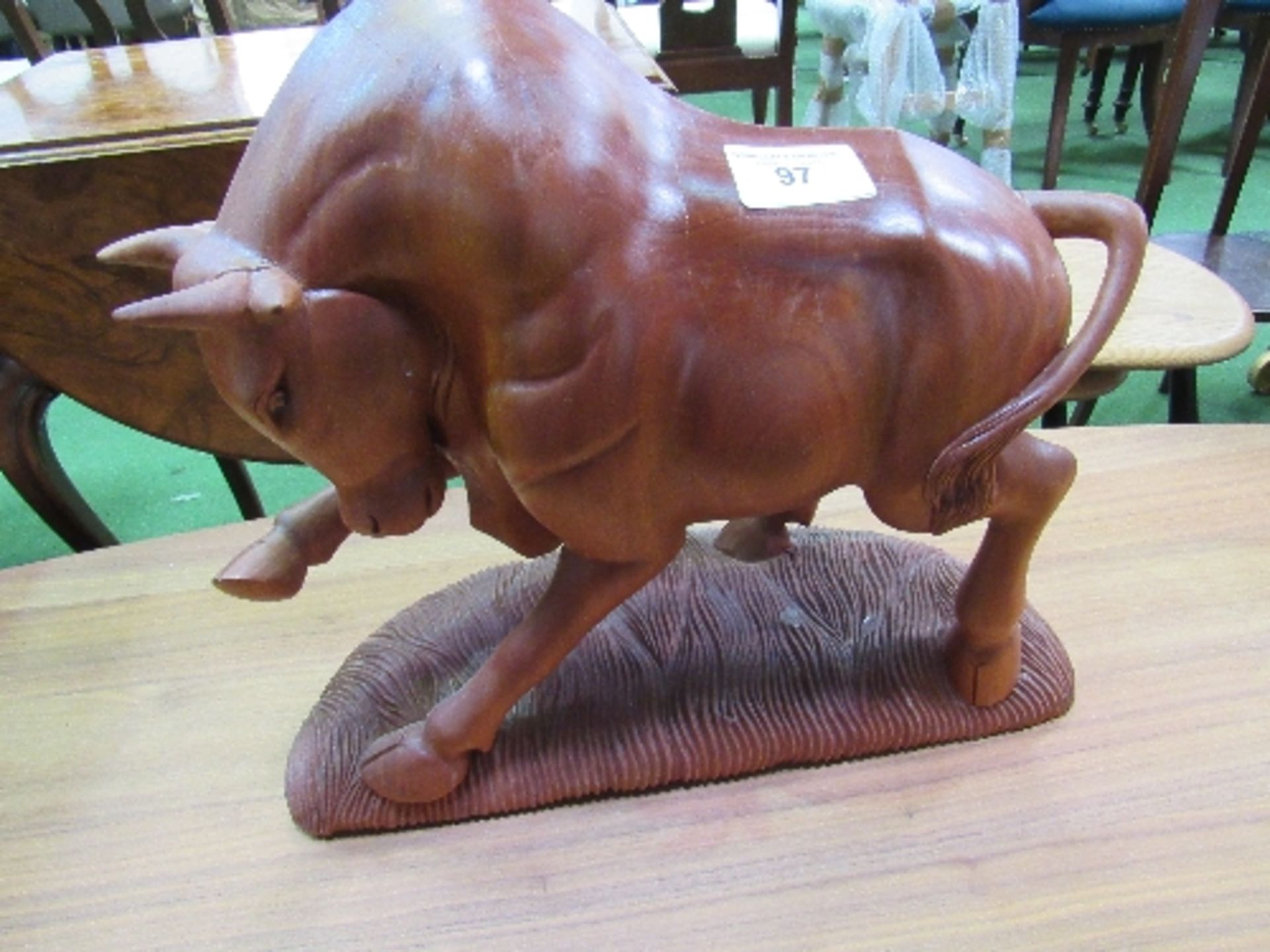 Large carved bull figurine