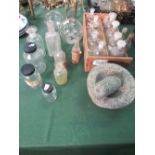 A qty of glass medical jars & a stone pestle & mortar