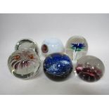 A collection of 6 paperweights including Caithness