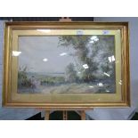 Large gilt framed & glazed watercolour of a lady in a country scene, signed Tatton Winter (William