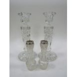 Pair of glass candlesticks with a pair of silver rimmed bud vases