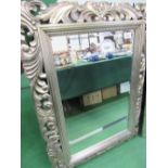 Ornately framed bevel-edged wall mirror, 49' x 36'