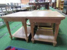 A pair of oak finish display tables, 25.5" x 19" (top) x 20" high