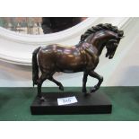 Model bronzed horse on wooden plinth