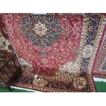 Red ground Keshan carpet, 2.8 x 2.0