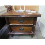 A pair of Indonesian hardwood bedside chests of 2 drawers