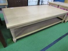 Matching coffee table with shelf below, 63" x 35.5" (top) x 16" high