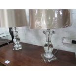 A pair of large glass table lamps with silk-effect shades. Approx 19" height.