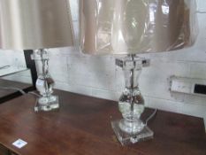 A pair of large glass table lamps with silk-effect shades. Approx 19" height.