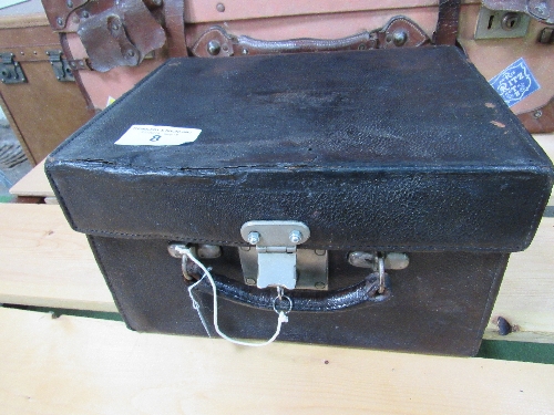 Antique black leather travel toilet case with lock & key. Interior is damask silk with removable