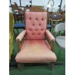 Edwardian mahogany framed button-back armchair on casters