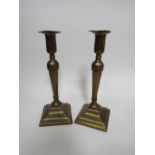 Pair of Georgian brass candlesticks