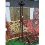 Mahogany tripod coat & hat rack with turned finial, height 80"