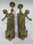 Pair of brass wall candle holders