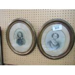 A pair of oval framed & glazed enhanced photographs of Victorian ladies