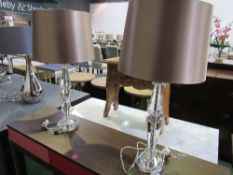 A pair of shaped glass table lamps & shades