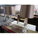 A pair of shaped glass table lamps & shades