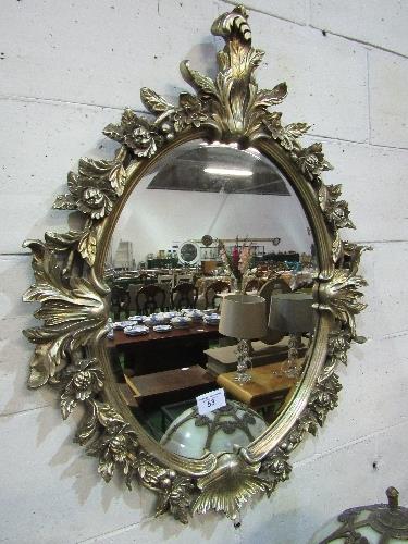 Ornately framed oval wall mirror, approx 42" x 32"