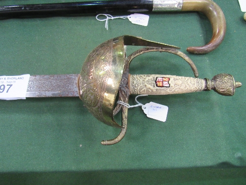 Large crested presentation sword with ivorine grip & ornate brass cup guard. The blade is heavily