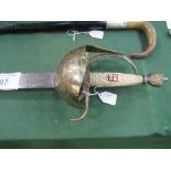 Large crested presentation sword with ivorine grip & ornate brass cup guard. The blade is heavily