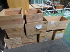 10 wooden wine cases. Price guide £40-60.