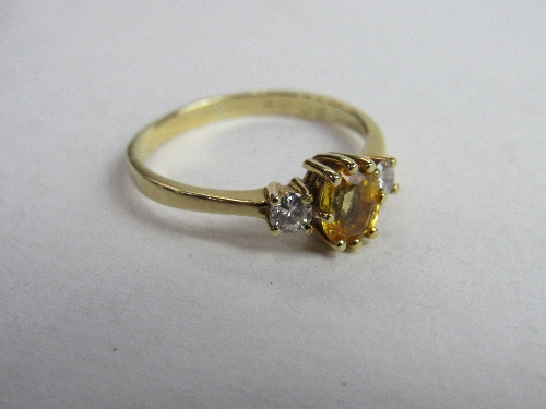 18ct gold ring set with an oval yellow stone (possibly diamond), flanked with diamonds, size Q 1/ - Image 3 of 4