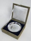 Sterling silver Armada dish with a Hong Kong dollar inset, boxed, wt 2.16 troy oz. Price guide £30-