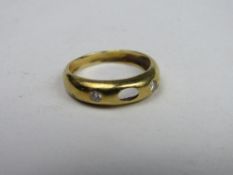 18ct gold ring with 2 diamonds (centre stone missing), weight 3.3gms, size M. Price guide £50-60.