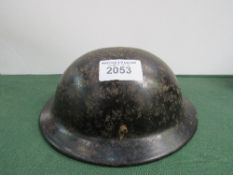 1940's British Civilian-issue Bakerlite Brodie helmet, marked Plasfort. Price guide £30-40.