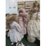 3 various porcelain dolls. Price guide £30-50.