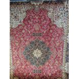 Red ground Keshan carpet, 2.8 x 2.0. Price guide £80-90.