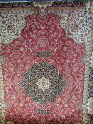 Red ground Keshan carpet, 2.8 x 2.0. Price guide £80-90.