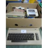 Commodore 64 c/w disc drive & other accessories. Price guide £40-50.