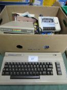 Commodore 64 c/w disc drive & other accessories. Price guide £40-50.