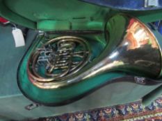 Italian-made large French horn in original hard case. Price guide £50-70.