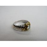 18ct white & yellow gold ring with single diamond, size L 1/2, wt 4.7gms. Price guide £100-150.