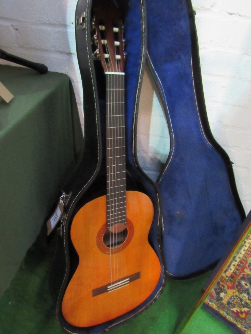 Yamaha C-40 acoustic guitar in hard case, good condition. Price guide £50-60.