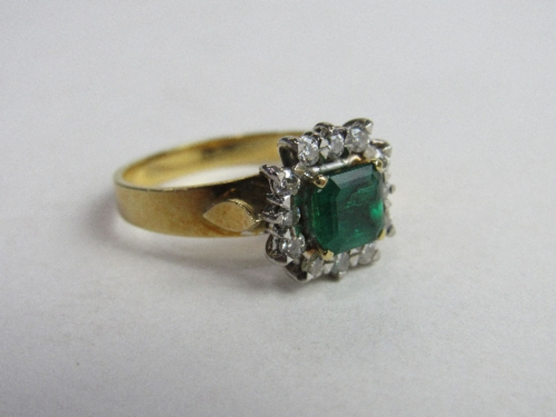 18ct gold ring with square green stone surrounded with diamonds, size Q 1/2, wt 5.7gms. Price - Image 3 of 4