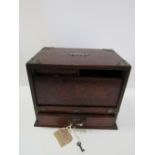 Tambour front oak smokers' box with match tray & permanent striker. Price guide £40-60.