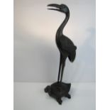 Large bronze 'Feng Shui' crane on dragon turtle. Price guide £60-90.