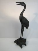 Large bronze 'Feng Shui' crane on dragon turtle. Price guide £60-90.